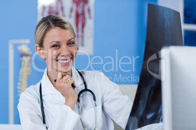 Physiotherapist holding a x-ray