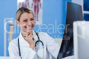 Physiotherapist holding a x-ray