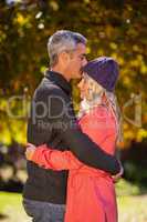 Mature couple hugging at park