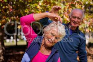 Elderly couple making fitness