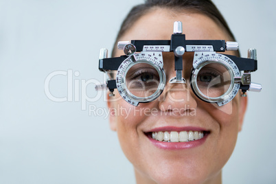 Female patient wearing messbrille during eye examination