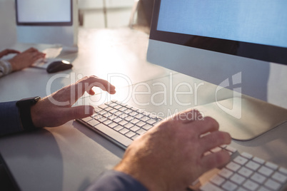 Mature student using computer