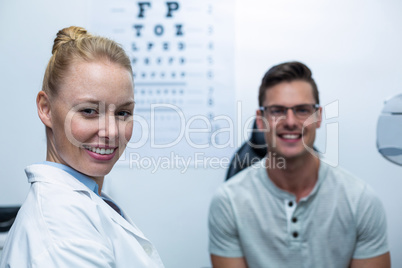 Portrait of female optometrist in ophthalmology clinic