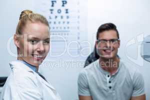 Portrait of female optometrist in ophthalmology clinic