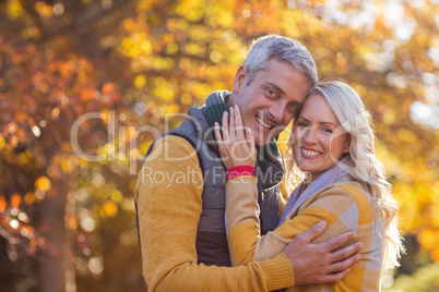 Portrait of romantic couple at park