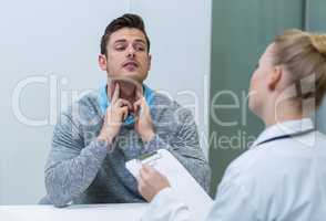 Patient discussing his problem with female patient