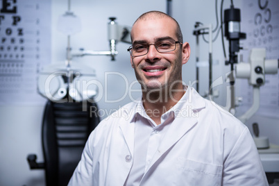 Portrait of male optometrist smiling
