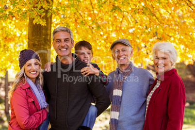 Happy multi-generation family at park