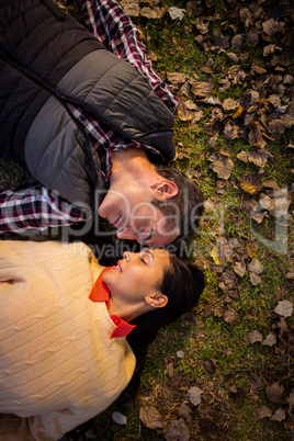 High angle view of couple romancing at park