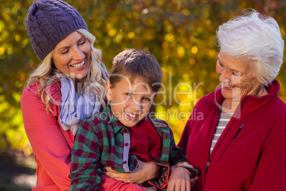 Happy boy with mother and grandmother
