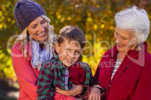 Happy boy with mother and grandmother