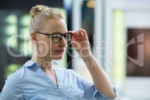 Female customer trying spectacle