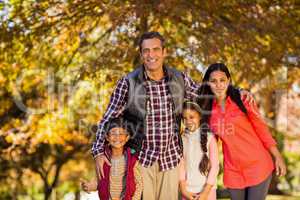 Portrait of happy family at park