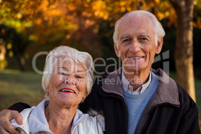 Smiling senior couple at park