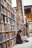 Mature student reading a book