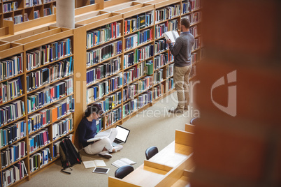 Mature student reading a book