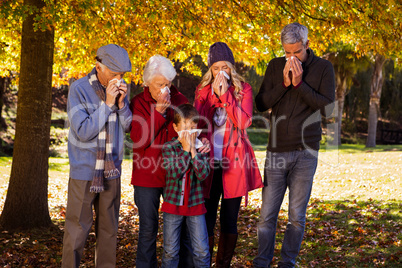 Sick family using tissues