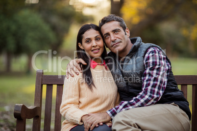 Couple sitting on bench