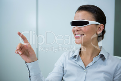 Woman using virtual video glasses