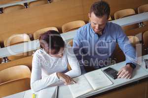 Mature students reading a book