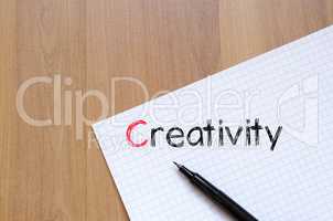 Creativity text concept on notebook