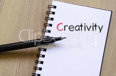 Creativity text concept on notebook