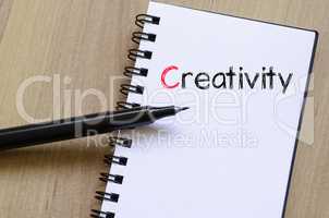 Creativity text concept on notebook