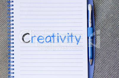 Creativity text concept on notebook