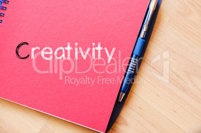 Creativity text concept on notebook