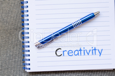 Creativity text concept on notebook