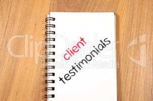 Client testimonials text concept on notebook