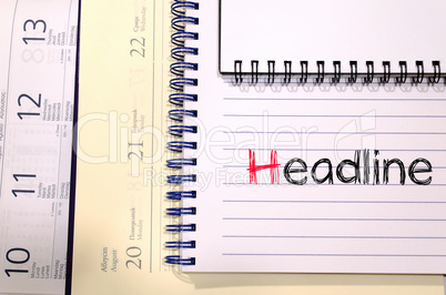 Headline text concept on notebook