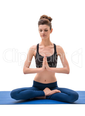 Yoga instructor sitting in lotus position