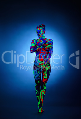 Erotica in ultraviolet light. Nude girl posing