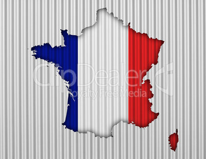 Karte und Fahne von Frankreich auf Wellblech