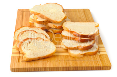 cut bread on breadboard