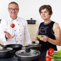 Woman with Chef Cook in the kitchen