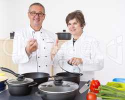 Woman with Chef Cook in the kitchen