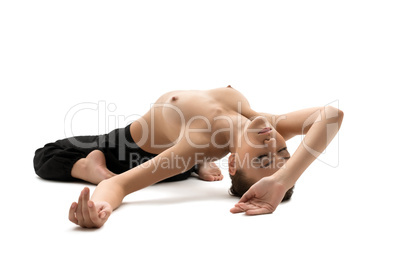 Topless girl doing yoga, isolated on white