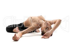 Topless girl doing yoga, isolated on white