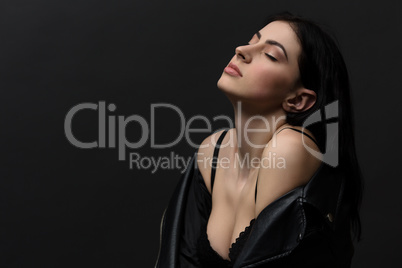 Beautiful brunnette model woman posing in studio