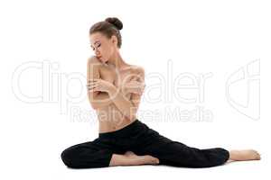 Nudity and yoga. Photo of topless brunette posing