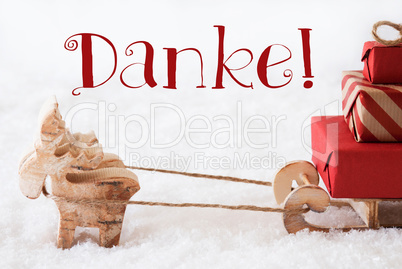 Reindeer With Sled On Snow, Danke Means Thank You