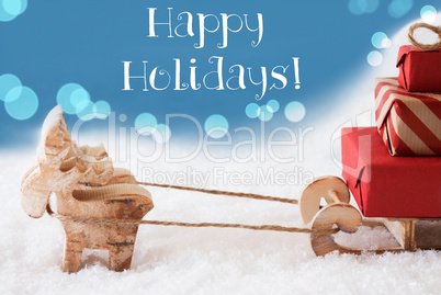 Reindeer, Sled, Light Blue Background, Text Happy Holidays