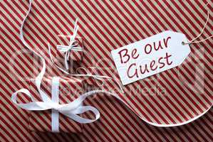 Two Gifts With Label, Text Be Our Guest