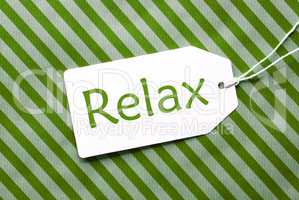 Label On Green Wrapping Paper, Text Relax