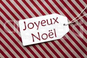 Label On Red Wrapping Paper, Joyeux Noel Means Merry Christmas