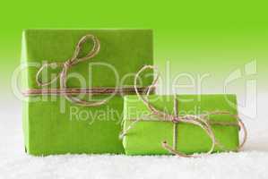 Two Gifts On Snow, Green Background