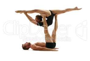 Acrobatics. Man and woman doing splits in support