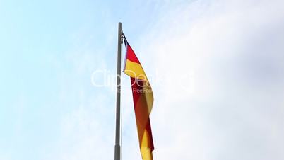 Textile flag of Germany on a flagpole